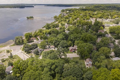 This stunning home is located on a hill overlooking Pewaukee - photo 3