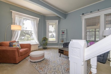 This stunning home is located on a hill overlooking Pewaukee - photo 4