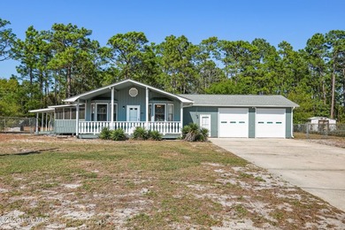 This charming home features three bedrooms & three full - photo 1