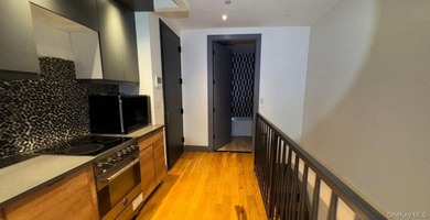 This multi-unit, eight-family-style home features 10 Bedrooms - photo 22