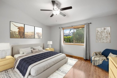 This spacious four-bedroom, four-bath home blends comfort with