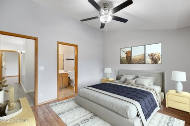 This spacious four-bedroom, four-bath home blends comfort with