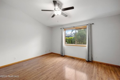 This spacious four-bedroom, four-bath home blends comfort with