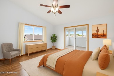 This spacious four-bedroom, four-bath home blends comfort with