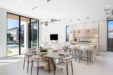 Now complete and move-in ready, 750 NE 69th Street is a striking - photo 18