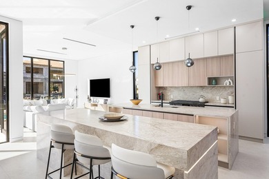 Now complete and move-in ready, 750 NE 69th Street is a striking - photo 19