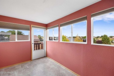 This spacious four-bedroom, four-bath home blends comfort with