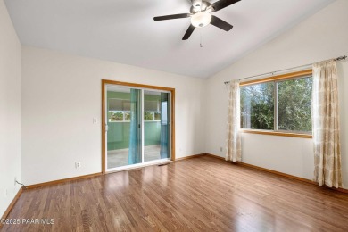 This spacious four-bedroom, four-bath home blends comfort with