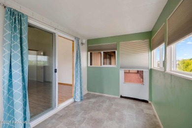 This spacious four-bedroom, four-bath home blends comfort with