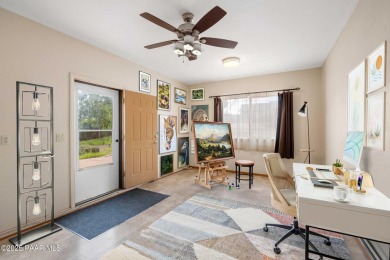 This spacious four-bedroom, four-bath home blends comfort with