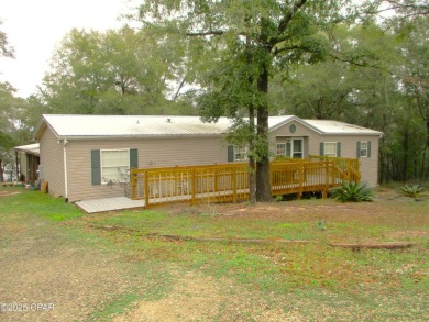 Lake Home For Sale in Chipley, Florida