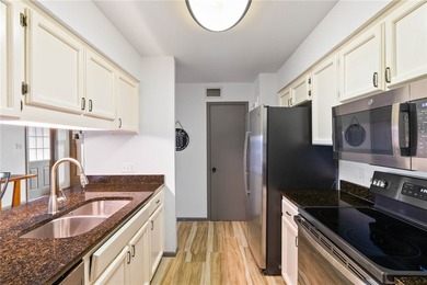 Welcome home to this beautifully updated end-unit townhome - photo 19