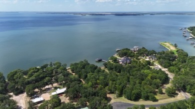Stunning Wooded 2.3 Acre Lot with 404 ft of Shoreline! - photo 1