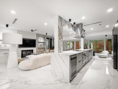 LUXURY updated 4 bedroom/3 bathroom SMART home in Coral Ridge - photo 11