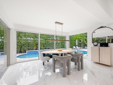 LUXURY updated 4 bedroom/3 bathroom SMART home in Coral Ridge - photo 13