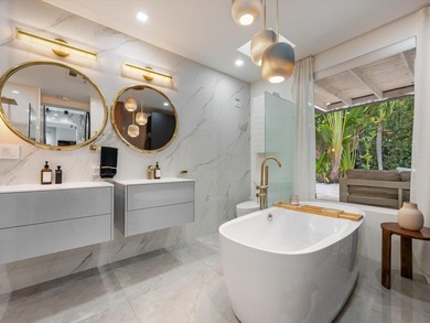 LUXURY updated 4 bedroom/3 bathroom SMART home in Coral Ridge - photo 18