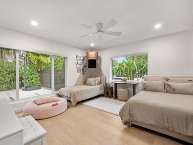 LUXURY updated 4 bedroom/3 bathroom SMART home in Coral Ridge - photo 20