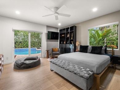 LUXURY updated 4 bedroom/3 bathroom SMART home in Coral Ridge - photo 23