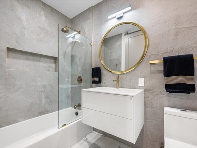 LUXURY updated 4 bedroom/3 bathroom SMART home in Coral Ridge - photo 25