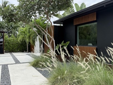 LUXURY updated 4 bedroom/3 bathroom SMART home in Coral Ridge - photo 28