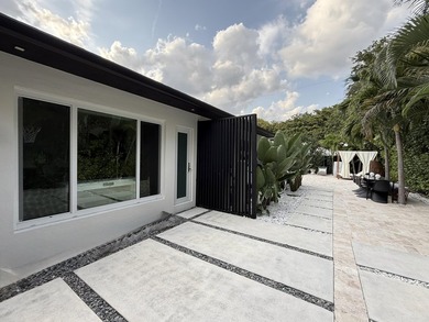 LUXURY updated 4 bedroom/3 bathroom SMART home in Coral Ridge - photo 30