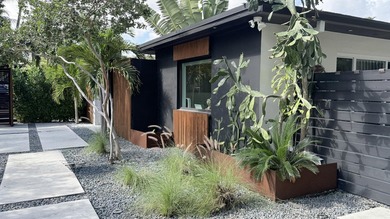 LUXURY updated 4 bedroom/3 bathroom SMART home in Coral Ridge - photo 32