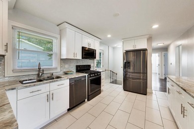 Welcome to this beautifully maintained 4-bedroom, 2-bath home - photo 8