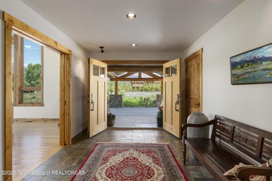 Tucked in the shadow of the majestic Tetons, this stunning home - photo 12