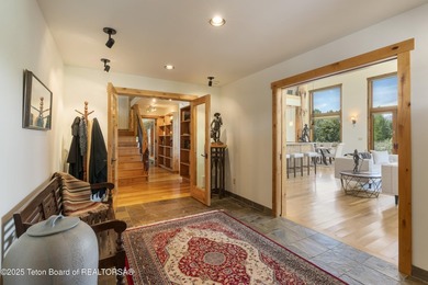 Tucked in the shadow of the majestic Tetons, this stunning home - photo 13
