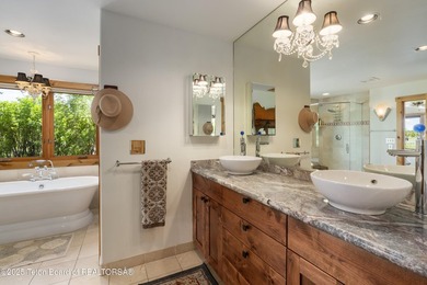 Tucked in the shadow of the majestic Tetons, this stunning home - photo 20