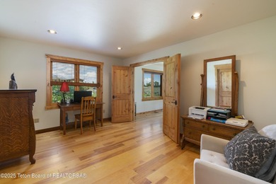 Tucked in the shadow of the majestic Tetons, this stunning home - photo 22