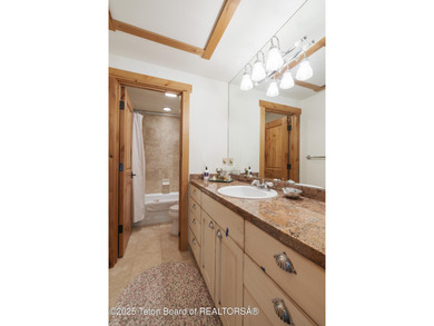 Tucked in the shadow of the majestic Tetons, this stunning home - photo 30