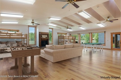 Tucked in the shadow of the majestic Tetons, this stunning home - photo 35