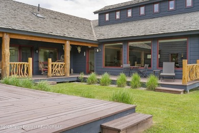 Tucked in the shadow of the majestic Tetons, this stunning home - photo 40
