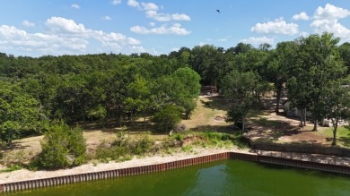 Stunning Wooded 2.3 Acre Lot with 404 ft of Shoreline! - photo 5