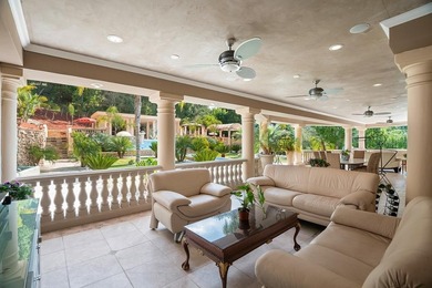 Welcome to an exquisite Mediterranean estate nestled in the - photo 42