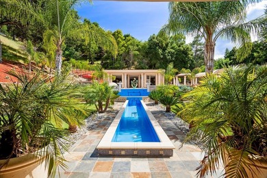 Welcome to an exquisite Mediterranean estate nestled in the - photo 44