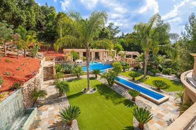 Welcome to an exquisite Mediterranean estate nestled in the - photo 47