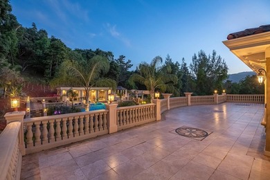 Welcome to an exquisite Mediterranean estate nestled in the - photo 48
