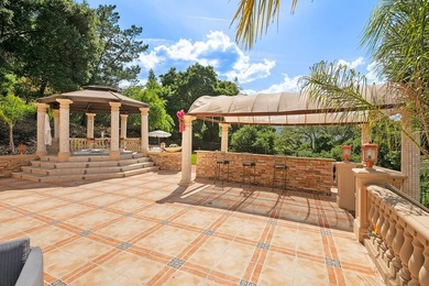 Welcome to an exquisite Mediterranean estate nestled in the - photo 50