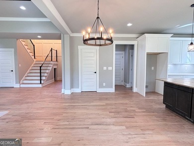 **Stunning New Construction with Owner's Suite on Main & Outdoor