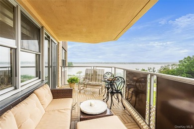 Wake up to stunning water views in this beautifully renovated - photo 1