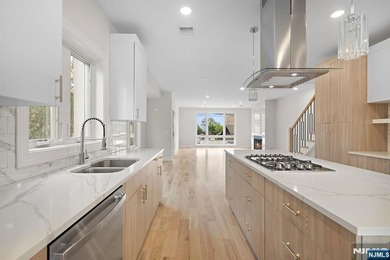 Stunning modern new construction new foundation unit in the - photo 11