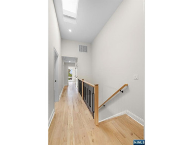 Stunning modern new construction new foundation unit in the - photo 13