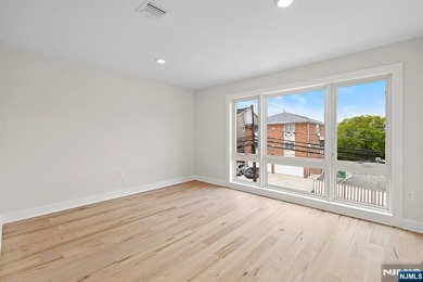 Stunning modern new construction new foundation unit in the - photo 14