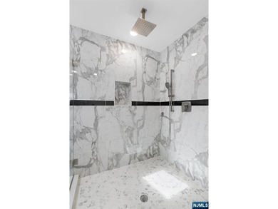 Stunning modern new construction new foundation unit in the - photo 18