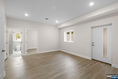 Stunning modern new construction new foundation unit in the - photo 26