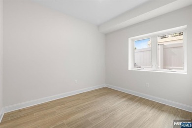 Stunning modern new construction new foundation unit in the - photo 27