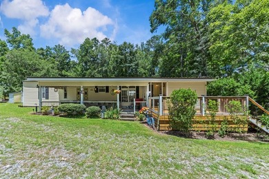 Dollbaby turnkey lake property! SUPERB LOCATION! Just bring your - photo 32