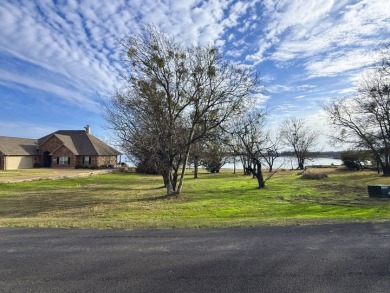 Open water view on half acre lot in subdivision on RC Lake! - photo 13